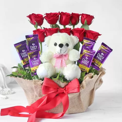 Stylish Arrangement of 10 Red Roses with Dairy Milk & Teddy