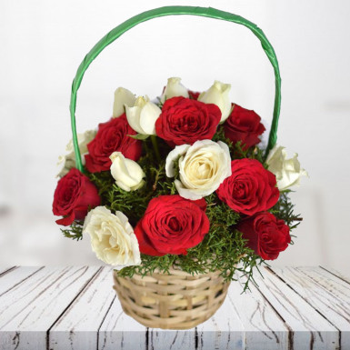 Radiant Wishes A basket of Red and White Roses