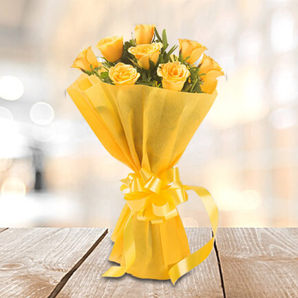 8 Yellow Roses with Yellow Paper Packing
